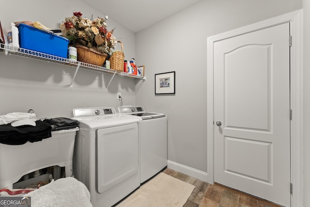 3521 Phoenix Cove Dr, Gainesville, GA 30506 - laundry room featuring separate washer and dryer, light wood-style floors, and baseboards