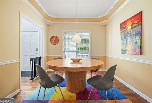 2004 Spicers Ln, Woodstock, GA 30189 - dining space featuring wood finished floors, ornamental molding, and baseboards