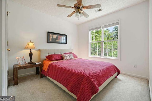 2004 Spicers Ln, Woodstock, GA 30189 - bedroom featuring carpet floors, baseboards, a textured ceiling, and a ceiling fan