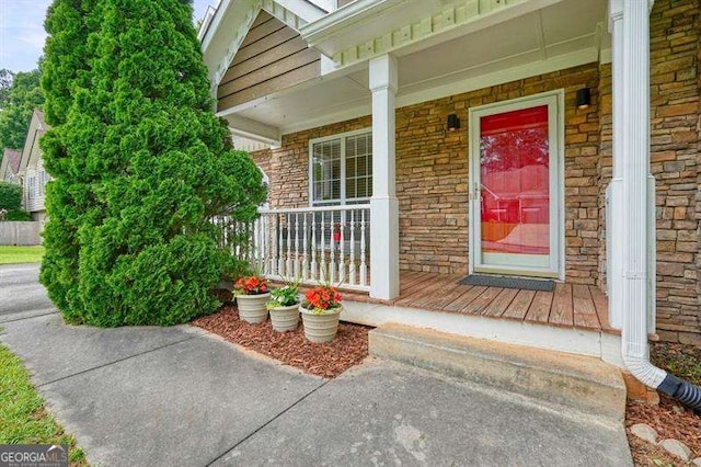 2004 Spicers Ln, Woodstock, GA 30189 - view of exterior entry with a porch