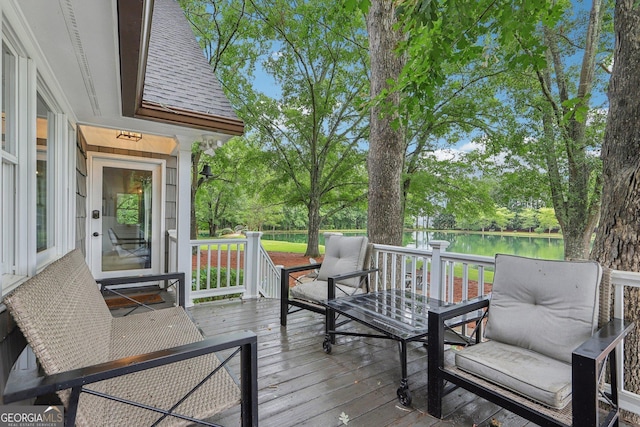 3612 Bill Gardner Pkwy, Locust Grove, GA 30248 - deck with a water view and view of scattered trees