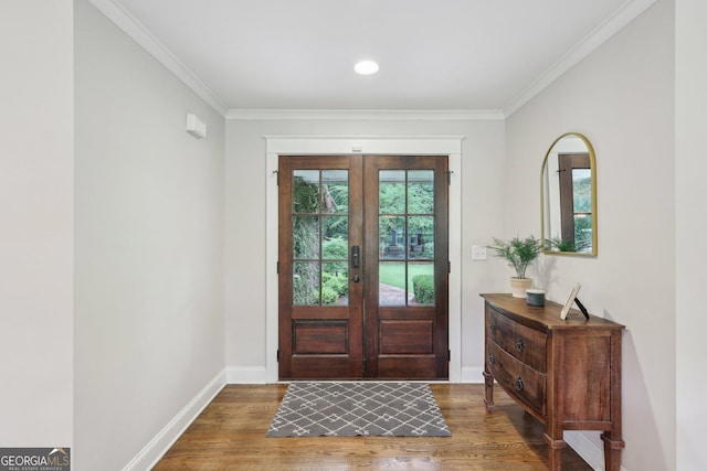3612 Bill Gardner Pkwy, Locust Grove, GA 30248 - entryway featuring french doors, wood finished floors, crown molding, and baseboards