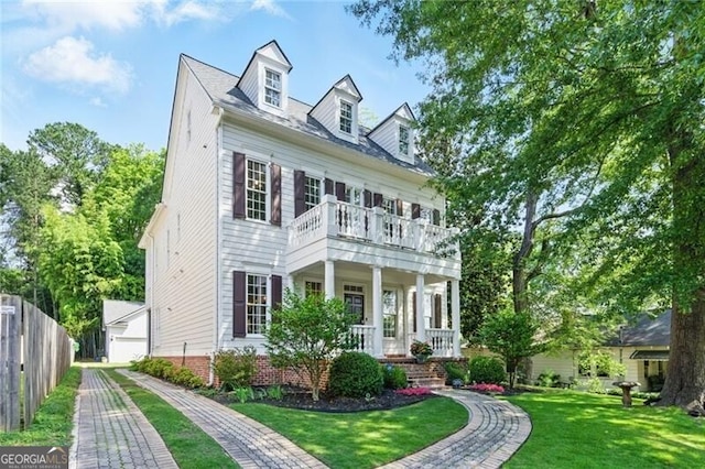 1070 Standard Dr NE, Brookhaven, GA 30319 - view of front facade featuring a balcony, covered porch, and a detached garage
