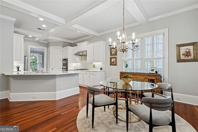 1070 Standard Dr NE, Brookhaven, GA 30319 - dining area with beamed ceiling, plenty of natural light, dark wood-style flooring, coffered ceiling, and a chandelier