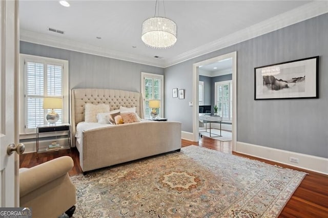 1070 Standard Dr NE, Brookhaven, GA 30319 - bedroom with wood finished floors, crown molding, a chandelier, and recessed lighting