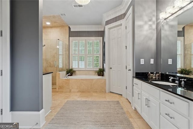 1070 Standard Dr NE, Brookhaven, GA 30319 - bathroom featuring vanity, a shower stall, a bath, and tile patterned flooring