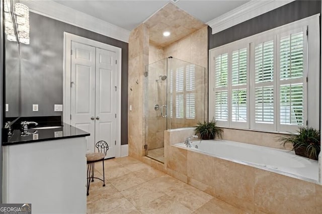 1070 Standard Dr NE, Brookhaven, GA 30319 - bathroom with a garden tub, ornamental molding, a stall shower, vanity, and tile patterned floors