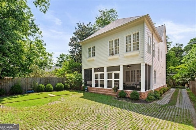 1070 Standard Dr NE, Brookhaven, GA 30319 - back of house featuring a sunroom and a fenced backyard