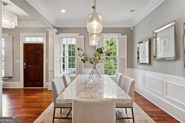 1070 Standard Dr NE, Brookhaven, GA 30319 - dining area featuring crown molding, healthy amount of natural light, dark wood-type flooring, wainscoting, and a decorative wall