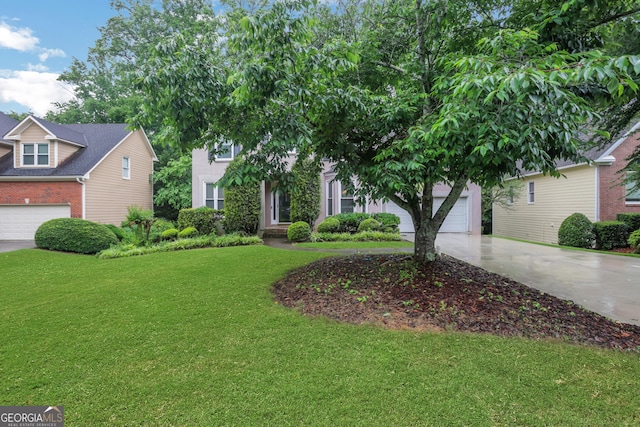 11280 Brookhollow Trl, Alpharetta, GA 30022 - obstructed view of property featuring concrete driveway, a front yard, brick siding, and a garage