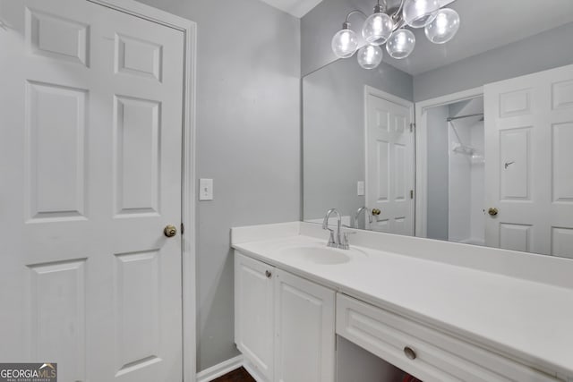 11280 Brookhollow Trl, Alpharetta, GA 30022 - bathroom featuring vanity and baseboards
