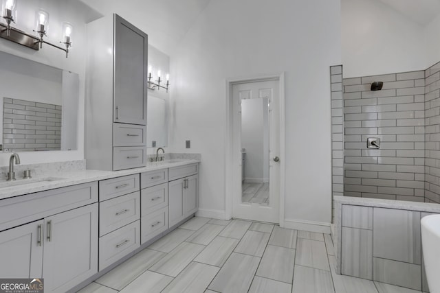 11280 Brookhollow Trl, Alpharetta, GA 30022 - bathroom featuring double vanity, tiled shower, and a freestanding bath
