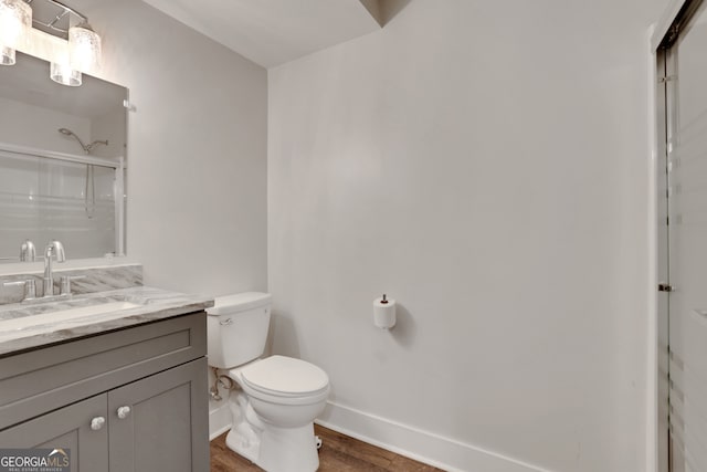11280 Brookhollow Trl, Alpharetta, GA 30022 - bathroom featuring an enclosed shower, vanity, and wood finished floors