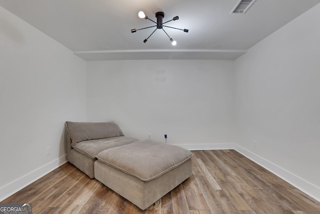 11280 Brookhollow Trl, Alpharetta, GA 30022 - living area with a chandelier and wood finished floors