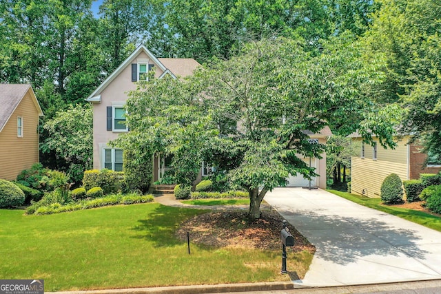 11280 Brookhollow Trl, Alpharetta, GA 30022 - view of front of property featuring concrete driveway, stucco siding, a front lawn, and a garage