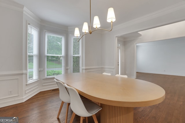 11280 Brookhollow Trl, Alpharetta, GA 30022 - dining area featuring a chandelier, plenty of natural light, dark wood-style floors, ornamental molding, and a wainscoted wall