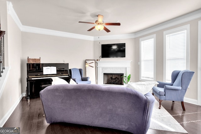 5910 Terrace Bend Way, Peachtree Corners, GA 30092 - living area with ceiling fan, a premium fireplace, crown molding, and dark wood-type flooring