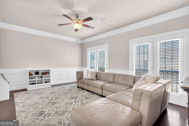 5910 Terrace Bend Way, Peachtree Corners, GA 30092 - living room with a ceiling fan, ornamental molding, dark wood finished floors, and wainscoting