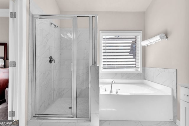5910 Terrace Bend Way, Peachtree Corners, GA 30092 - ensuite bathroom with marble finish floors, a bath, and a marble finish shower