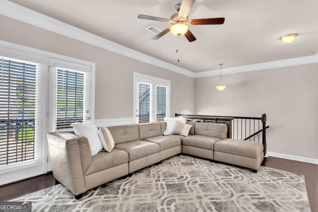 5910 Terrace Bend Way, Peachtree Corners, GA 30092 - living room featuring wood finished floors, a ceiling fan, healthy amount of natural light, and crown molding