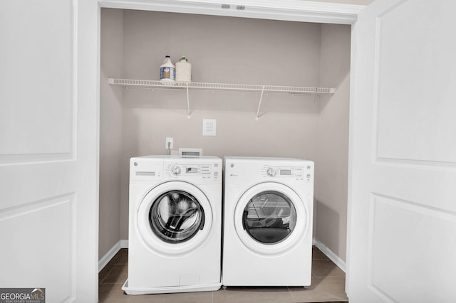 5910 Terrace Bend Way, Peachtree Corners, GA 30092 - laundry room with independent washer and dryer and tile patterned floors