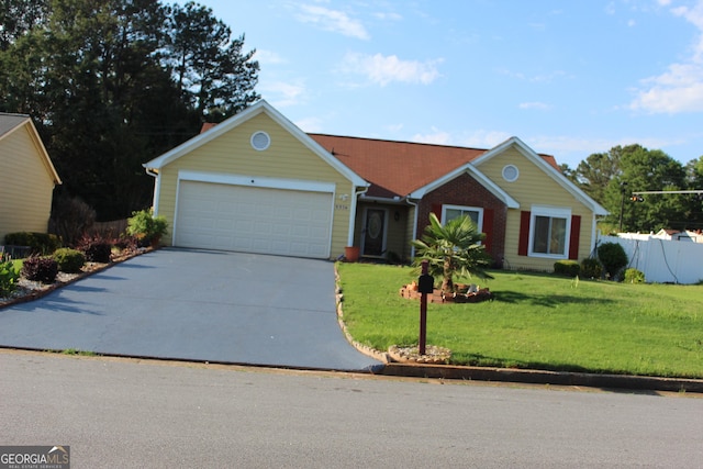 5574 Mccrossin Cir, Lithonia, GA 30038 - view of front of home featuring concrete driveway and an attached garage