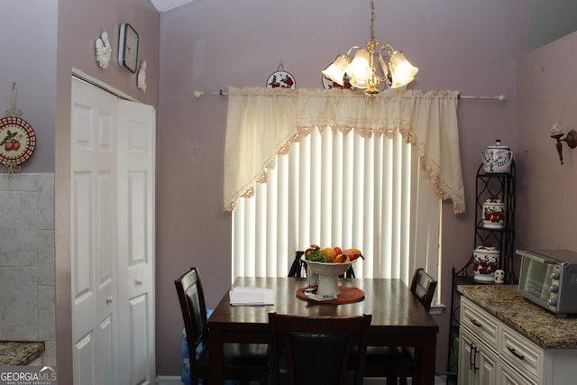 5574 Mccrossin Cir, Lithonia, GA 30038 - dining room with a chandelier
