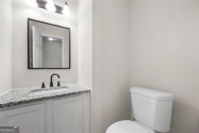 1486 Rogers Crossing Dr, Lithonia, GA 30058 - bathroom with toilet and vanity