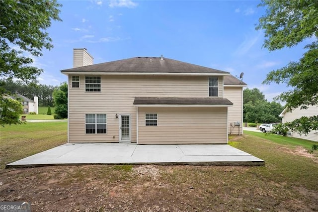 1486 Rogers Crossing Dr, Lithonia, GA 30058 - back of house with a patio area, a yard, and a chimney