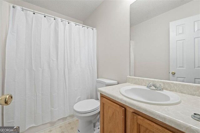1486 Rogers Crossing Dr, Lithonia, GA 30058 - full bathroom featuring vanity, a textured ceiling, and a shower with curtain