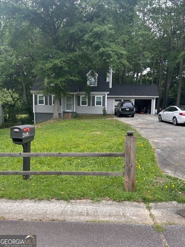 4514 Tifton Ct, Powder Springs, GA 30127 - view of front facade with an attached garage and driveway
