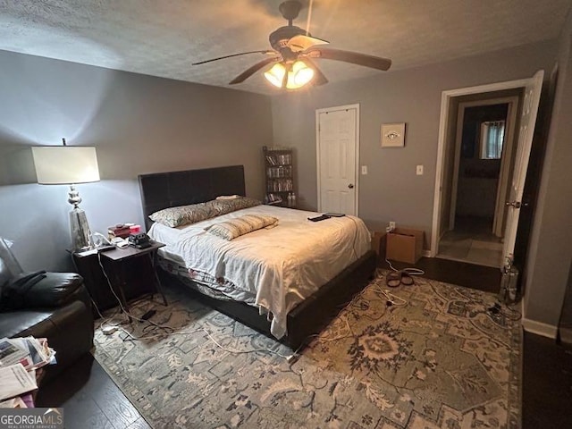 4514 Tifton Ct, Powder Springs, GA 30127 - bedroom featuring wood finished floors and ceiling fan