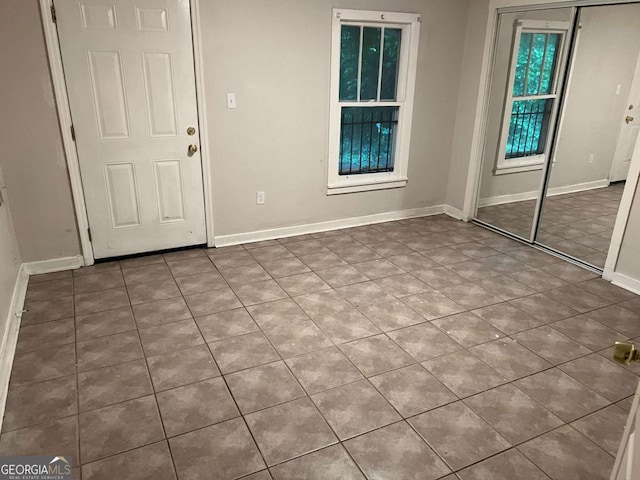 1829 Mercer Ave, College Park, GA 30337 - entrance foyer featuring tile patterned floors and baseboards