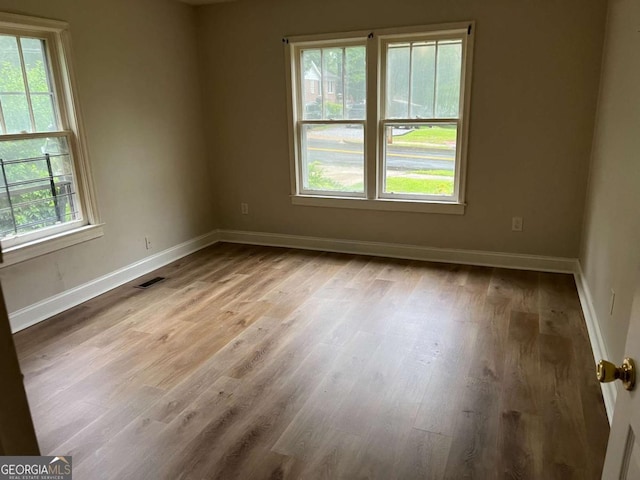 1829 Mercer Ave, College Park, GA 30337 - spare room with wood finished floors and baseboards