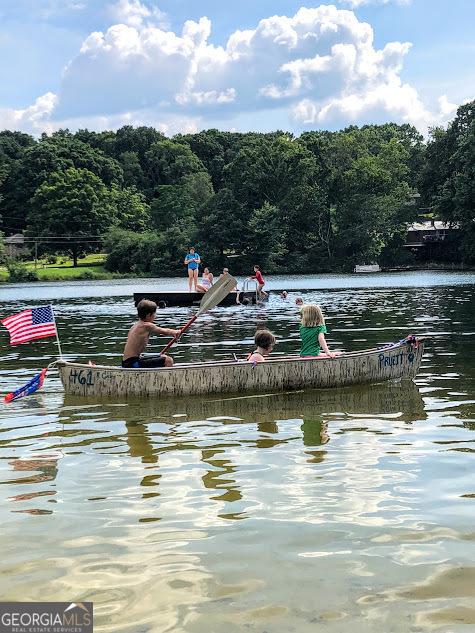 696 Kenilworth Cir, Stone Mountain, GA 30083 - water view featuring a forest