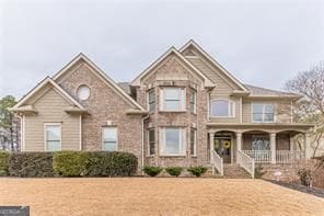 979 Pathview Ct, Dacula, GA 30019 - craftsman-style house featuring a porch