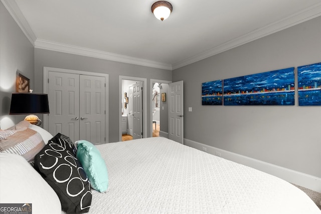 979 Pathview Ct, Dacula, GA 30019 - bedroom featuring ornamental molding, a closet, baseboards, and ensuite bath