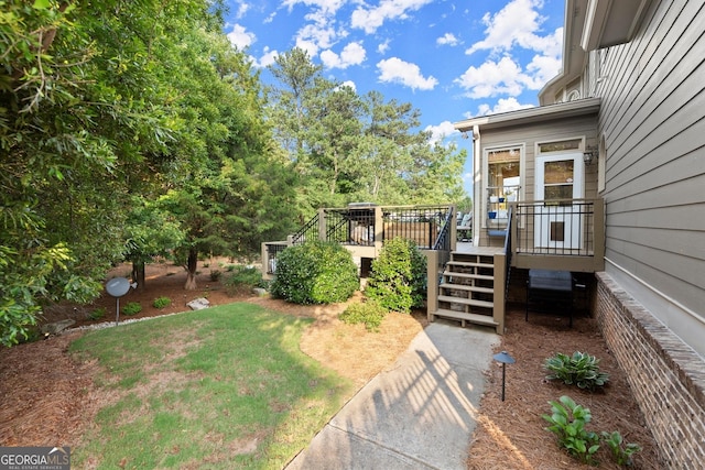 979 Pathview Ct, Dacula, GA 30019 - view of yard with a deck and stairs