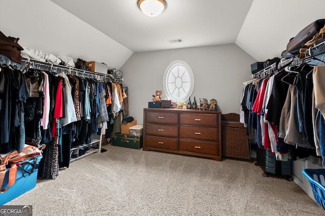 979 Pathview Ct, Dacula, GA 30019 - walk in closet with lofted ceiling and carpet flooring