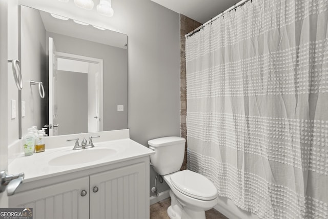 979 Pathview Ct, Dacula, GA 30019 - bathroom featuring toilet, vanity, and a shower with shower curtain