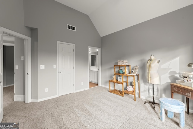 979 Pathview Ct, Dacula, GA 30019 - carpeted bedroom featuring high vaulted ceiling, baseboards, and ensuite bath