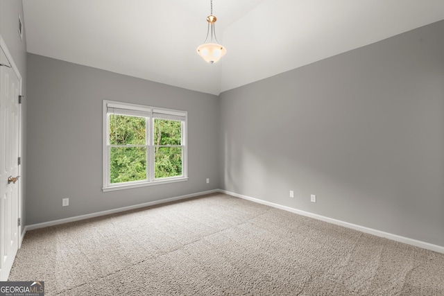 979 Pathview Ct, Dacula, GA 30019 - carpeted spare room featuring baseboards and vaulted ceiling