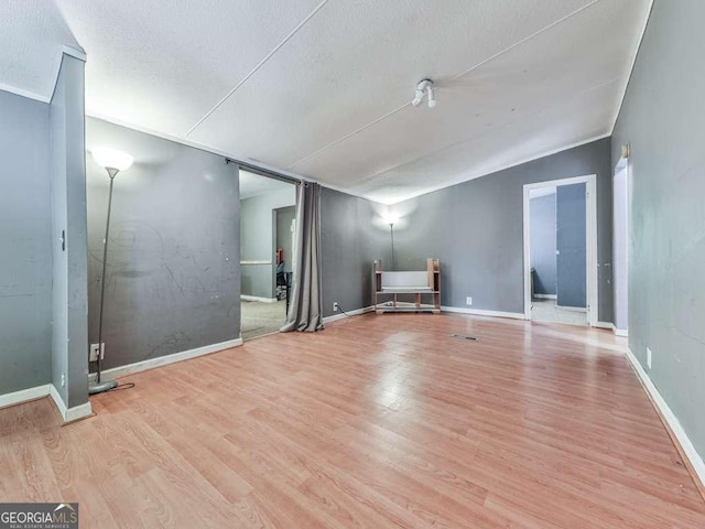 108 Casual Ridge Run, Jasper, GA 30143 - unfurnished room with wood finished floors, a textured ceiling, and baseboards