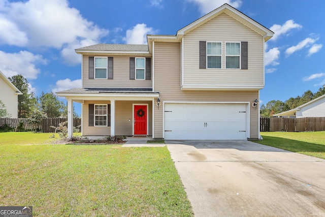 17 Sagefield Dr, Ellabell, GA 31308 - traditional home featuring a garage, driveway, and covered porch