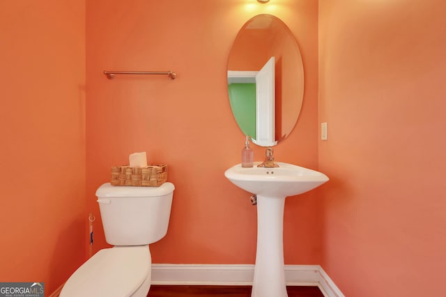 17 Sagefield Dr, Ellabell, GA 31308 - bathroom featuring toilet and baseboards