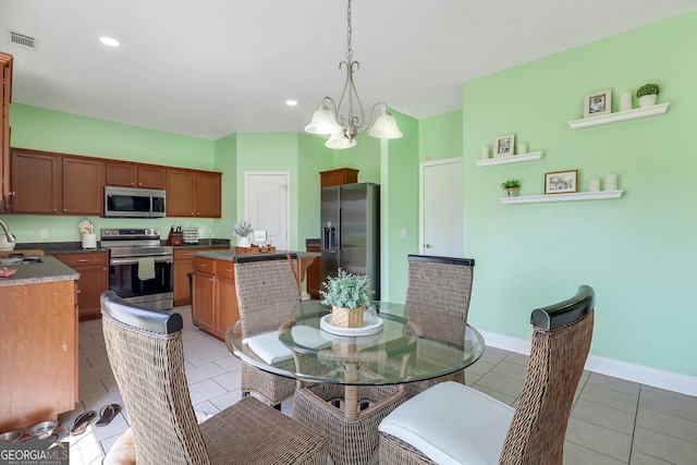 17 Sagefield Dr, Ellabell, GA 31308 - dining area with light tile patterned floors, a chandelier, baseboards, and recessed lighting