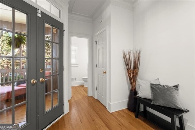 1860 Hill Chase, Alpharetta, GA 30022 - hallway featuring french doors, light wood finished floors, baseboards, and ornamental molding