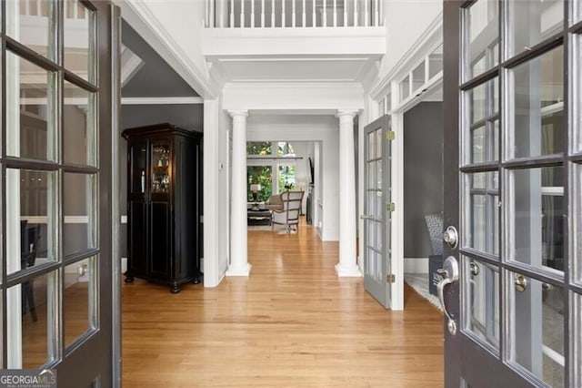 1860 Hill Chase, Alpharetta, GA 30022 - entrance foyer with french doors, decorative columns, light wood-style floors, and crown molding