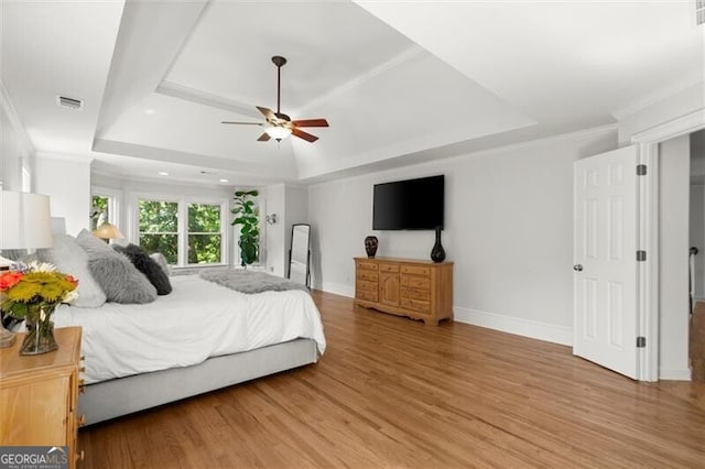 1860 Hill Chase, Alpharetta, GA 30022 - bedroom featuring a tray ceiling, wood finished floors, recessed lighting, ornamental molding, and a ceiling fan