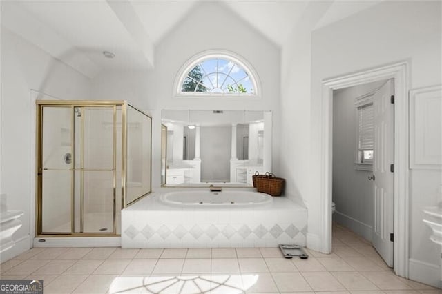 1860 Hill Chase, Alpharetta, GA 30022 - full bathroom featuring vaulted ceiling, a jetted tub, a stall shower, tile patterned floors, and toilet